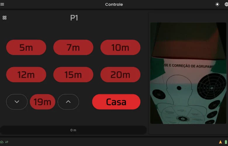 Tela de controle da pista 1 com botões de distância e a imagem da câmera do alvo